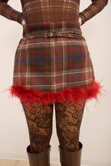 Gonna tartan con piume