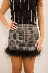 Shorts con piume