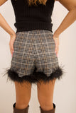 Shorts con piume