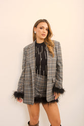 Giacca tartan con piume