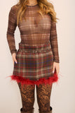 Gonna tartan con piume
