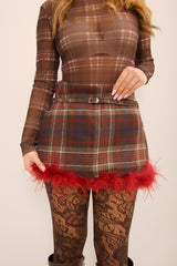 Gonna tartan con piume