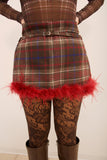 Gonna tartan con piume