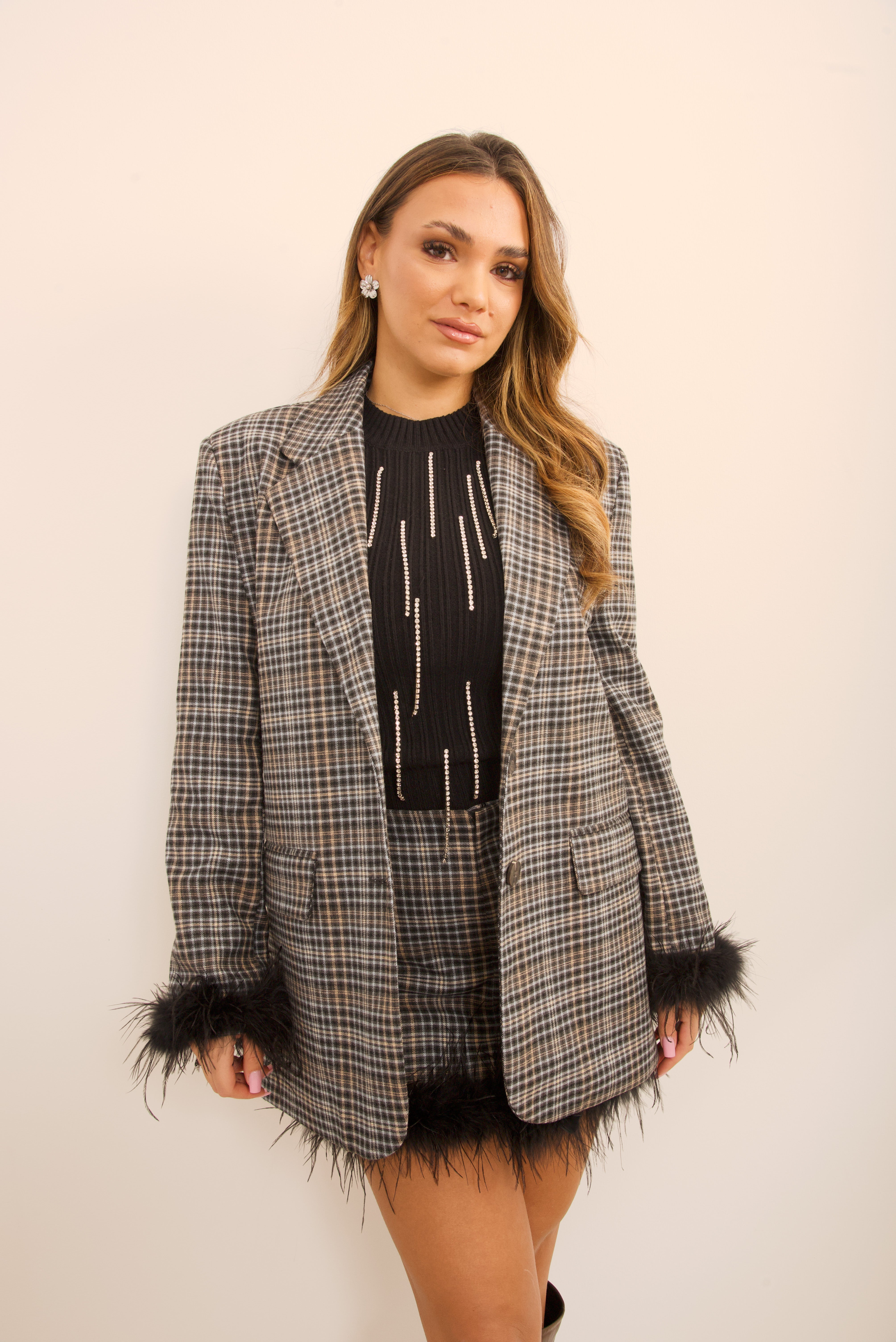 Giacca tartan con piume