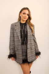 Giacca tartan con piume