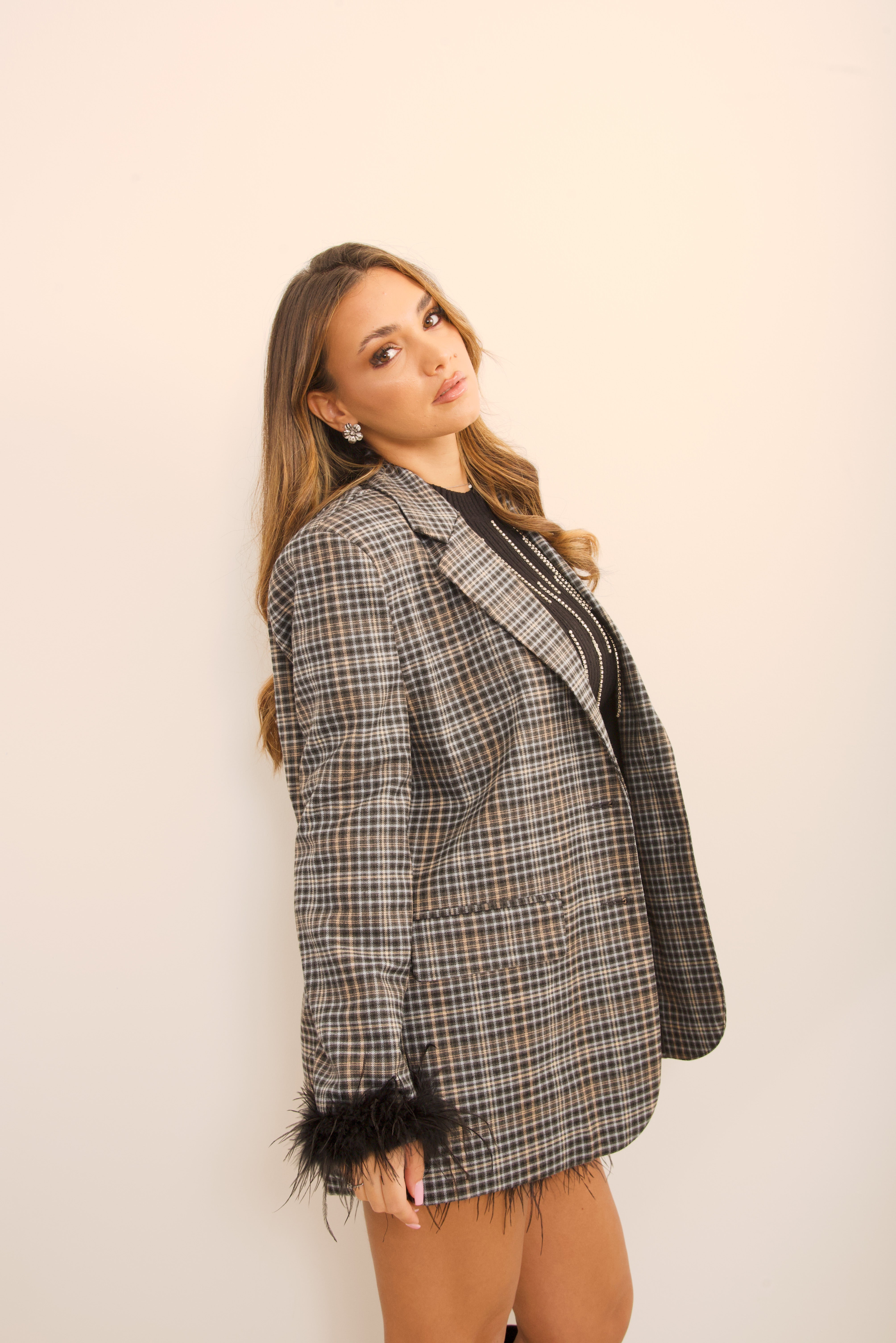 Giacca tartan con piume