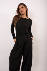 Pantalone bottone asimmetrico